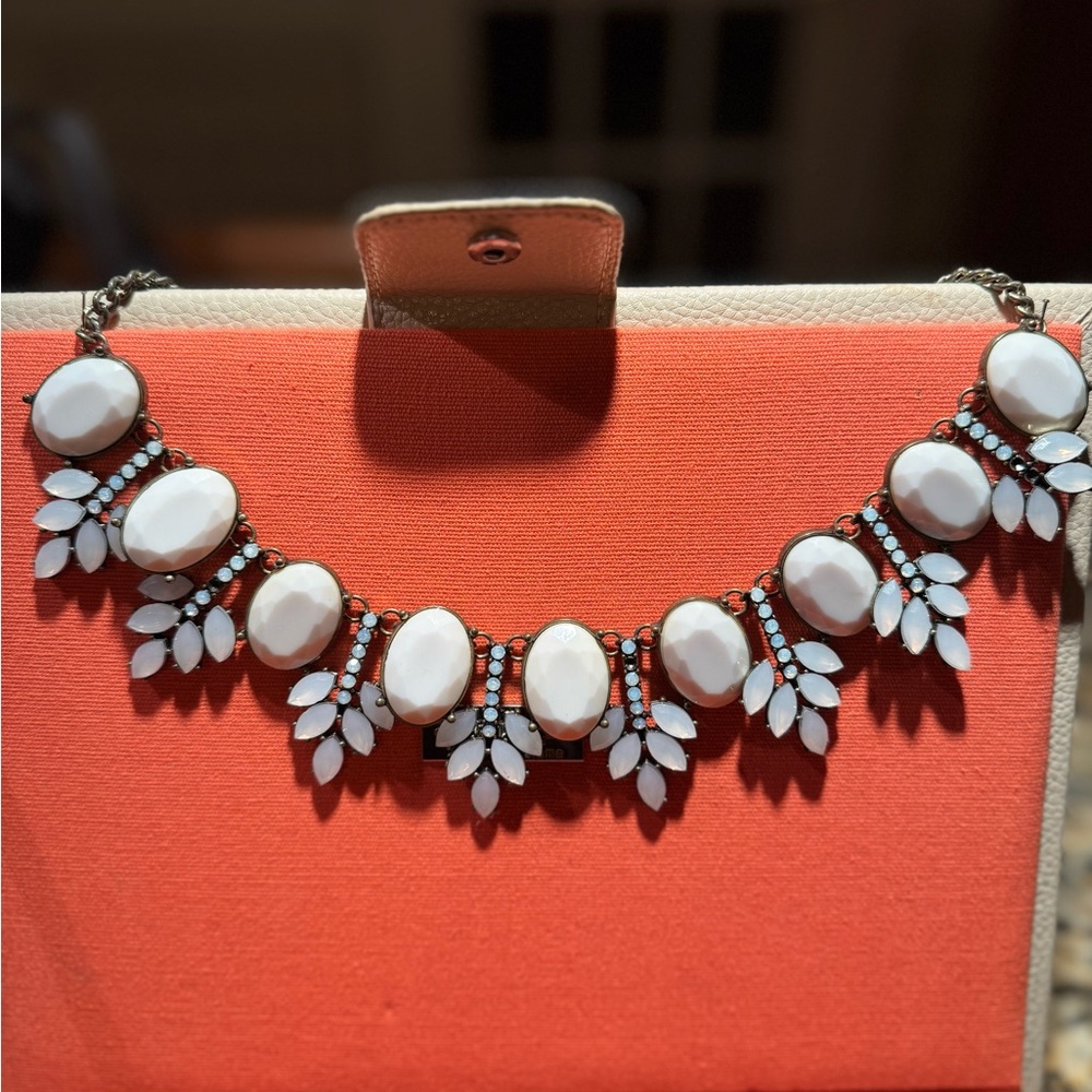 Statement necklace.  White and light blue stones
